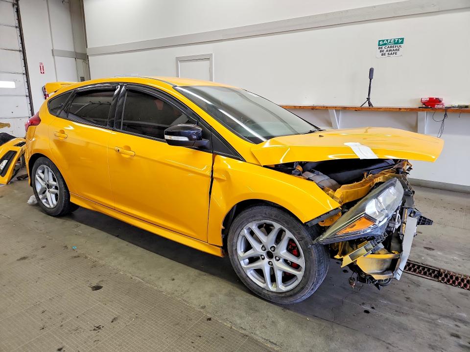 Foto 4 de la subasta – 2016 FORD FOCUS con VIN 1FADP3L90GL310687