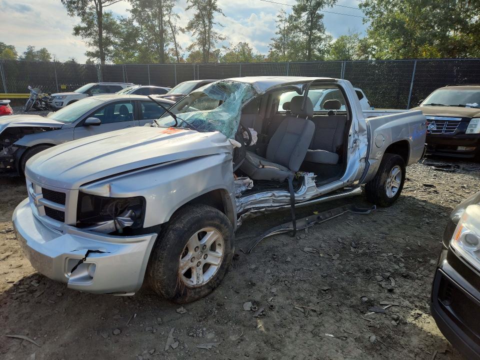 DODGE DAKOTA 2011 with VIN 1D7RW3GK1BS537097 - Photo from auction