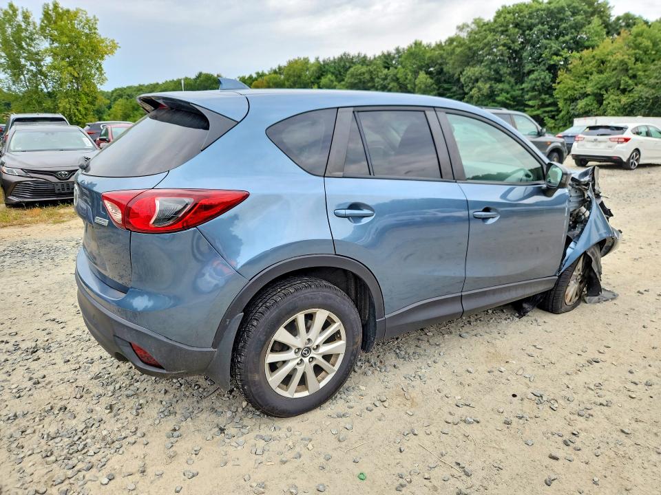 Снимка 3 от търг – 2015 MAZDA CX-5 с VIN JM3KE4CY6F0448729