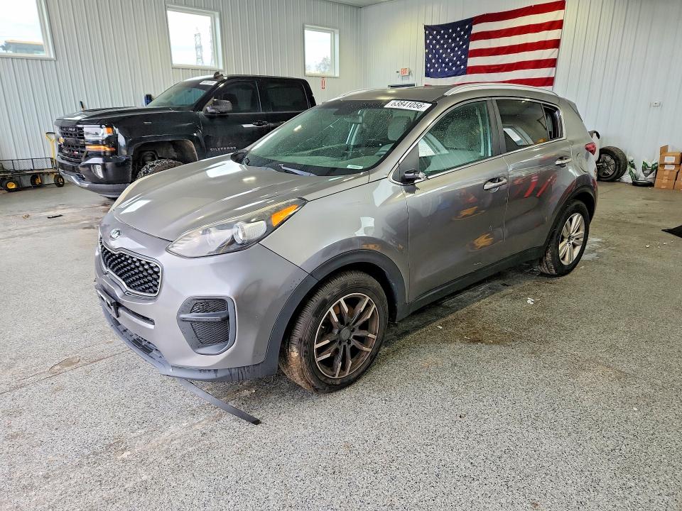 KIA SPORTAGE 2018 with VIN KNDPM3AC2J7380660 - Photo from auction