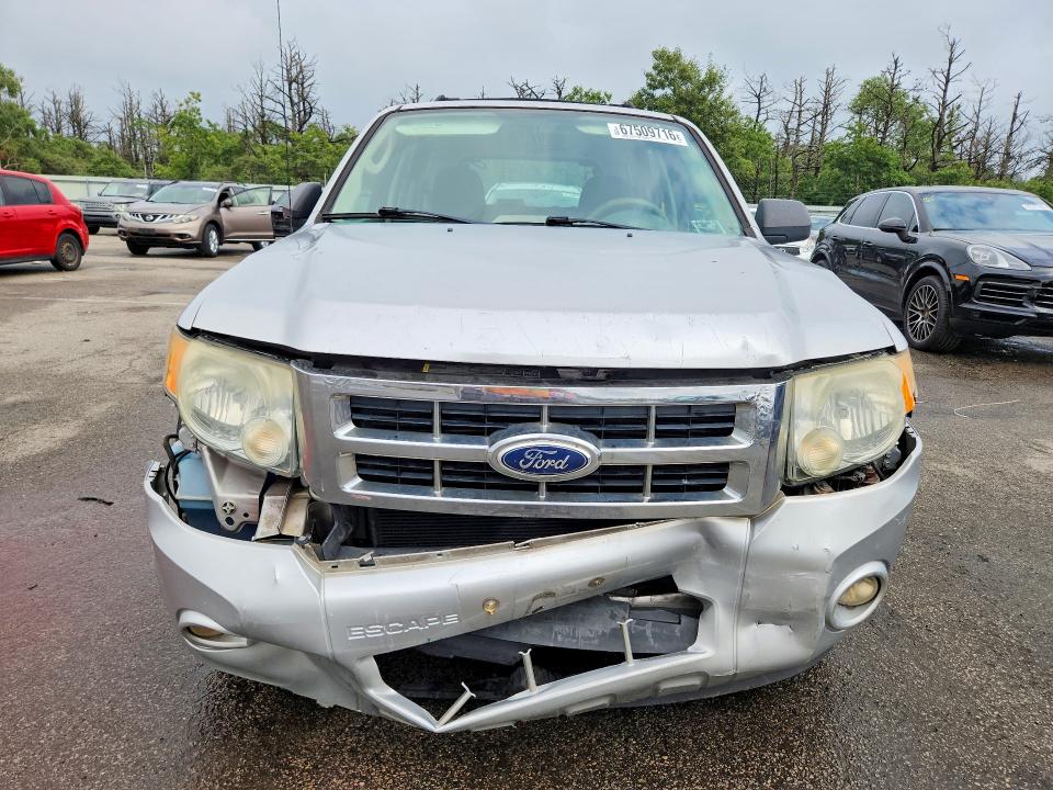 Photo 5 from auction – 2010 FORD ESCAPE with VIN 1FMCU0C74AKB95807
