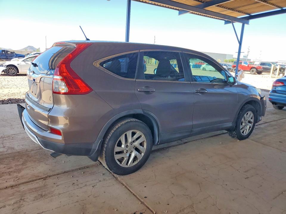 Photo 3 from auction – 2015 HONDA CR-V with VIN 3CZRM3H52FG701022