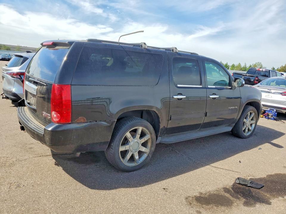 Photo 3 from auction – 2011 GMC YUKON XL with VIN 1GKS2HE33BR388784