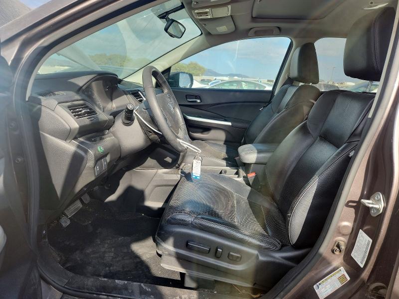 Photo 7 from auction – 2015 HONDA CR-V with VIN 2HKRM3H79FH557466