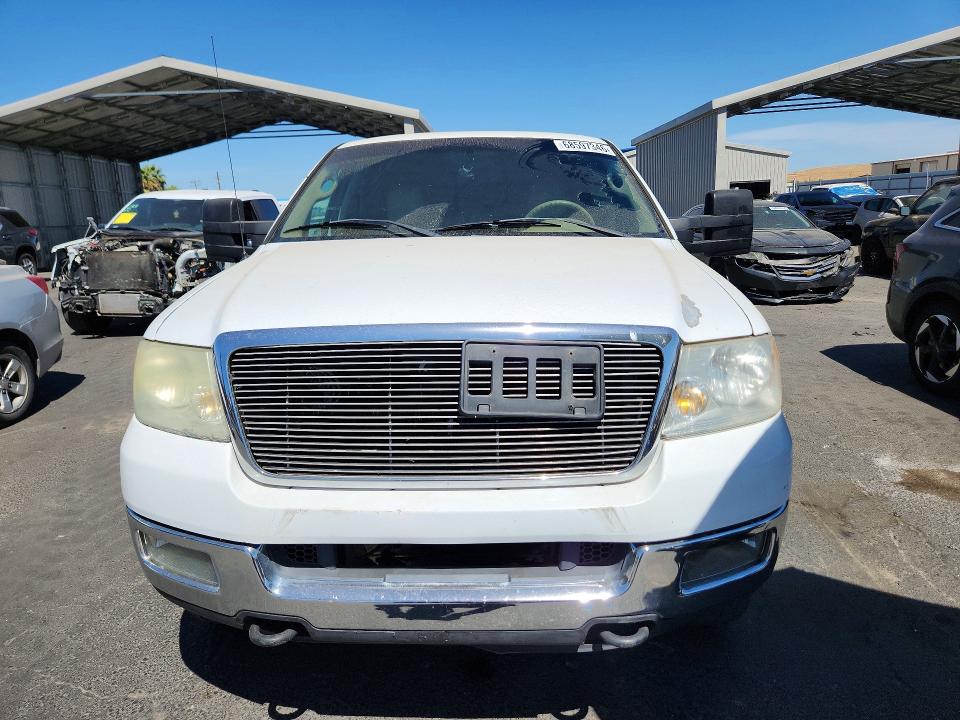 Photo 5 from auction – 2005 FORD F150 with VIN 1FTPW14505KE95157