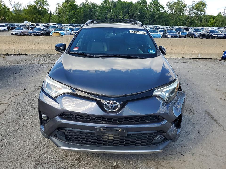 Photo 5 from auction – 2016 TOYOTA RAV4 with VIN JTMJFREV4GJ100294