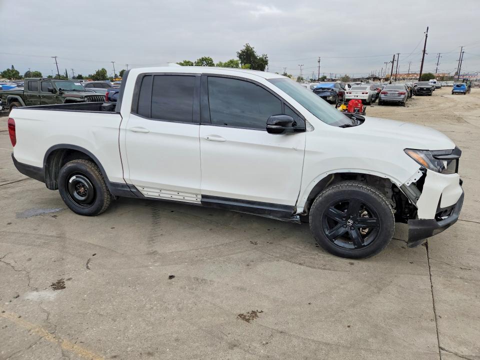 Photo 4 from auction – 2021 HONDA RIDGELINE with VIN 5FPYK3F82MB018400