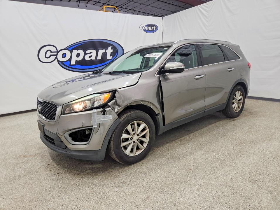 KIA SORENTO 2016 with VIN 5XYPG4A31GG061680 - Photo from auction