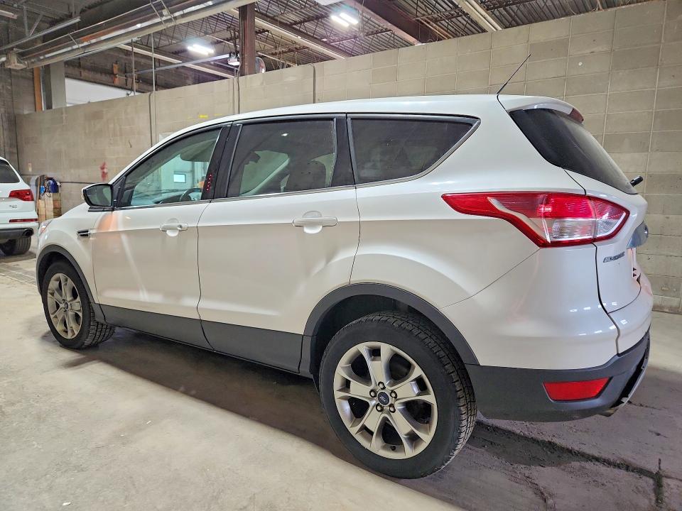 Photo 2 from auction – 2013 FORD ESCAPE with VIN 1FMCU9H98DUD78442