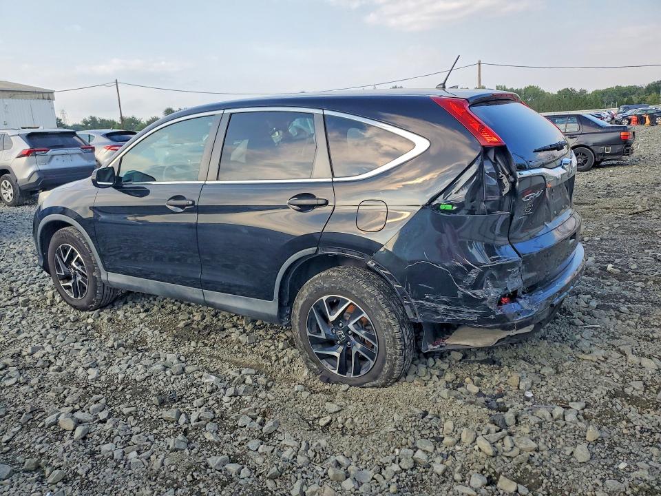 Photo 2 from auction – 2016 HONDA CR-V with VIN 2HKRM4H43GH620025
