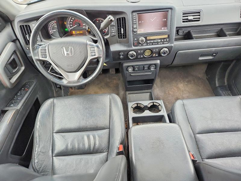 Photo 8 from auction – 2010 HONDA RIDGELINE with VIN 5FPYK1F58AB503498