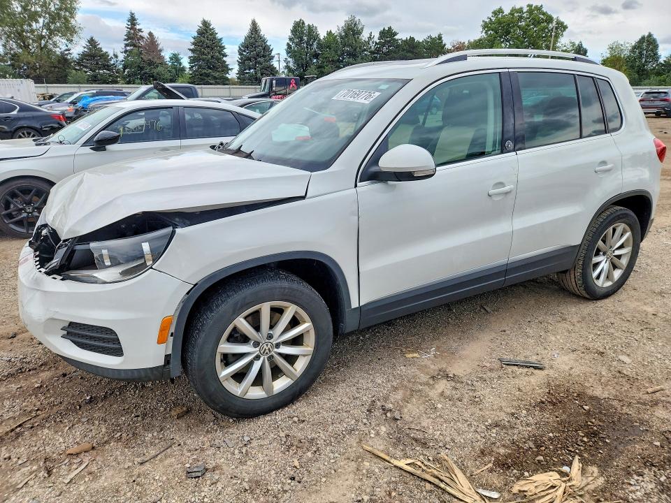 VOLKSWAGEN TIGUAN 2017 с VIN WVGSV7AX7HW503317 - Снимка от търг