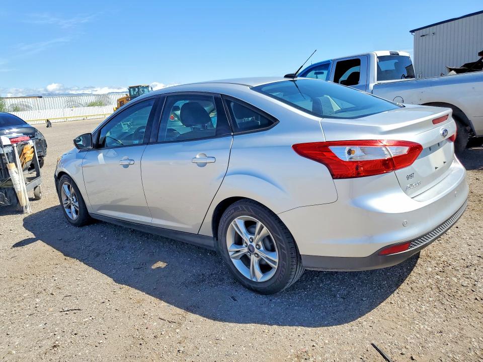 Снимка 2 от търг – 2014 FORD FOCUS с VIN 1FADP3F24EL272487