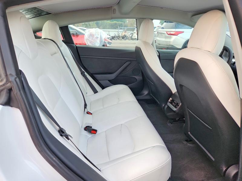 Photo 10 from auction – 2021 TESLA MODEL 3 with VIN 5YJ3E1EA8MF028836