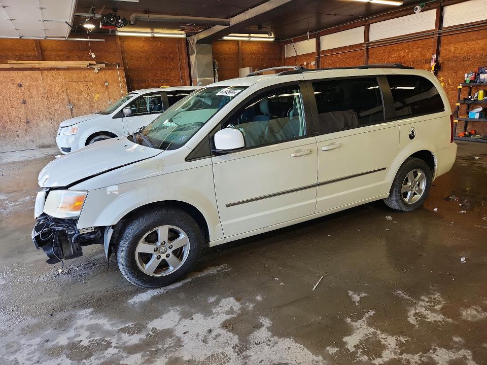 DODGE GRAND CARAVAN 2010 with VIN 2D4RN5D11AR211579 - Photo from auction