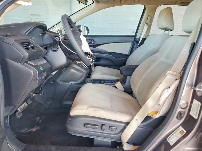 Photo 7 from auction – 2015 HONDA CR-V with VIN 3CZRM3H52FG701022