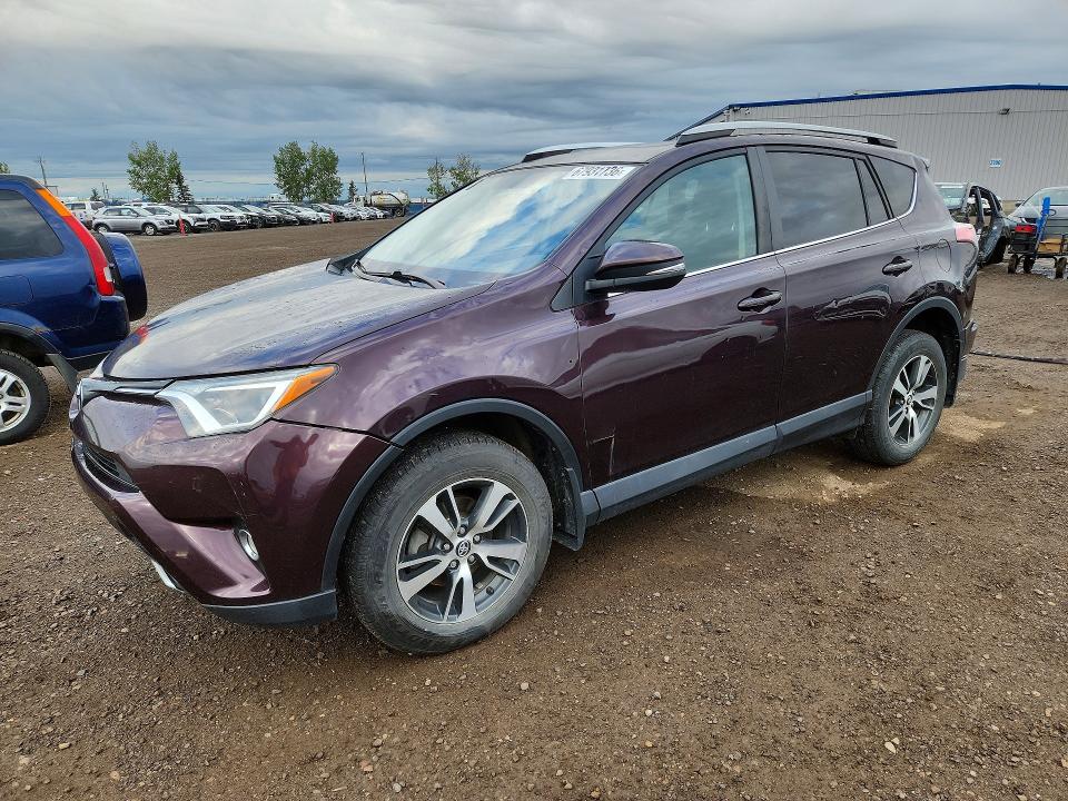 TOYOTA RAV4 2016 с VIN 2T3RFREV8GW477439 - Снимка от търг