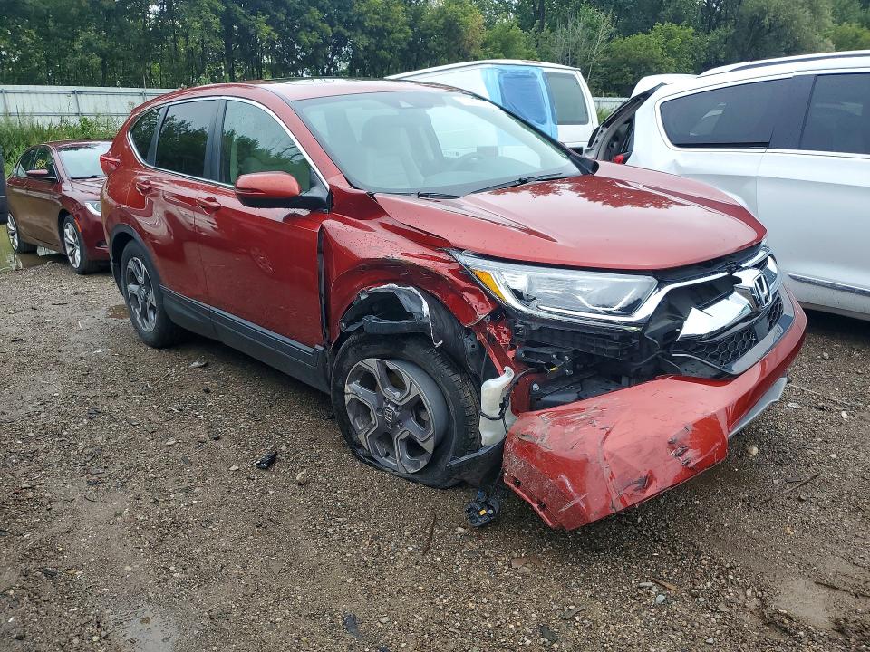 Photo 4 from auction – 2017 HONDA CR-V with VIN 5J6RW2H50HL035112