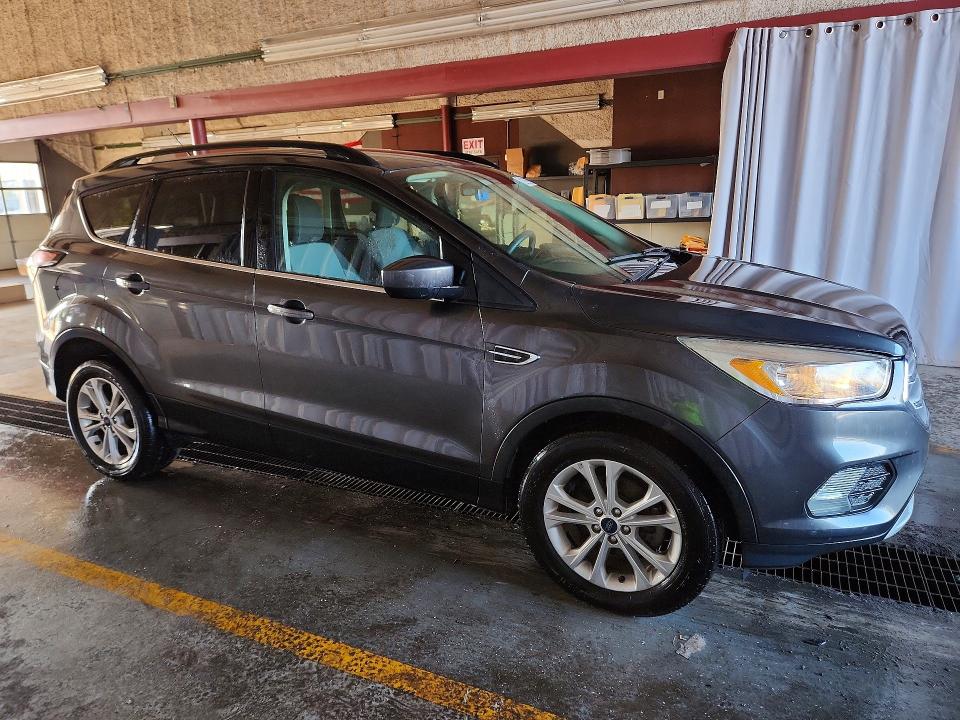 Photo 4 from auction – 2018 FORD ESCAPE with VIN 1FMCU0GD7JUD06015