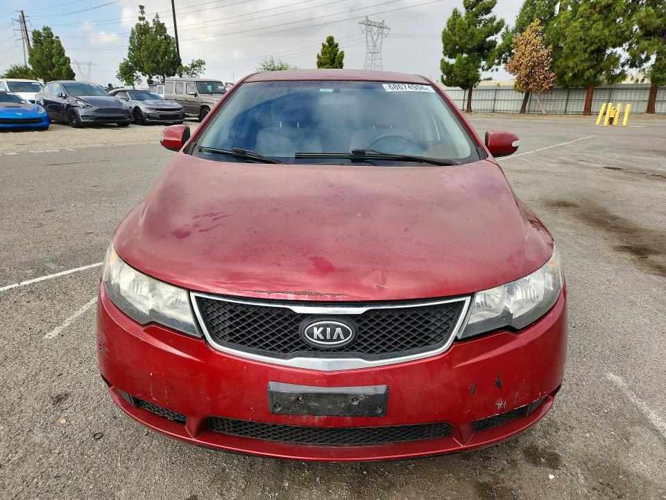 Photo 5 from auction – 2010 KIA FORTE with VIN KNAFU4A26A5808926