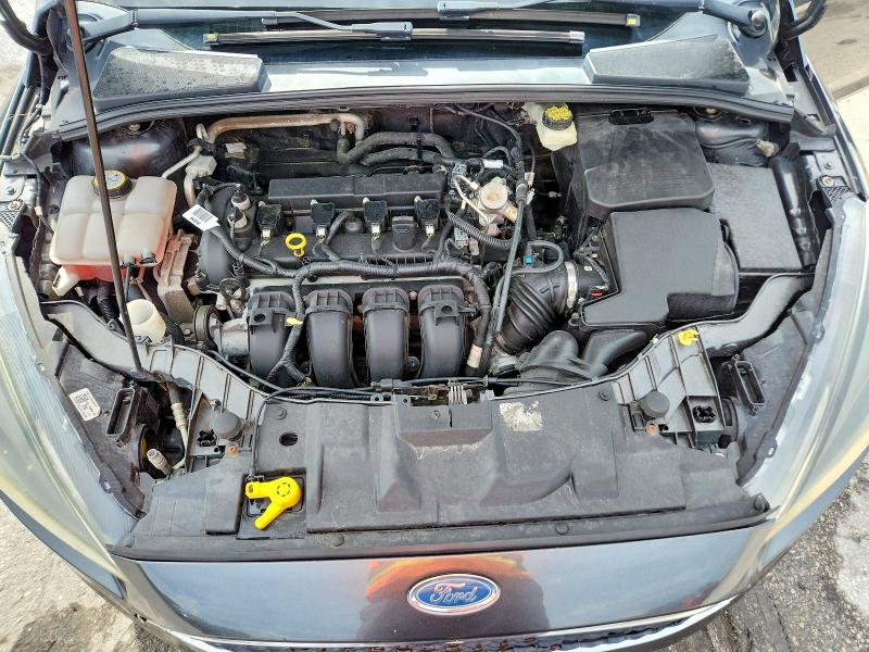 Foto 11 de la subasta – 2017 FORD FOCUS con VIN 1FADP3H22HL218817