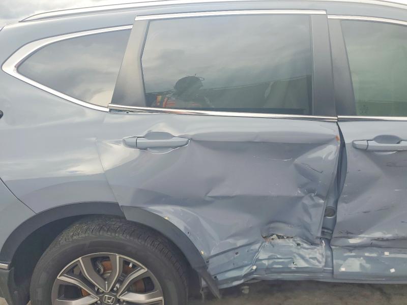 Photo 11 from auction – 2021 HONDA CR-V with VIN 7FART6H91ME019883