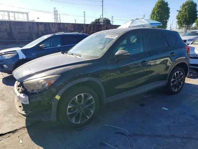 MAZDA CX-5 2016 with VIN JM3KE2DY4G0815311 - Photo from auction