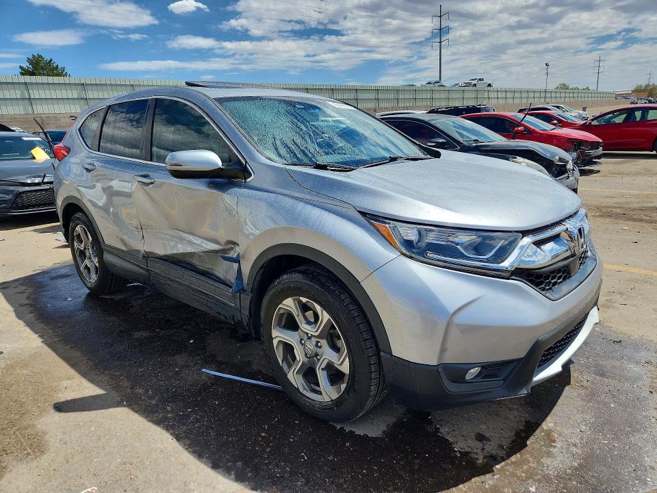 Photo 4 from auction – 2017 HONDA CR-V with VIN 7FARW1H83HE018581