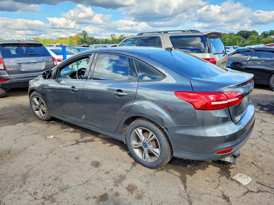 Снимка 2 от търг – 2018 FORD FOCUS с VIN 1FADP3F20JL268298