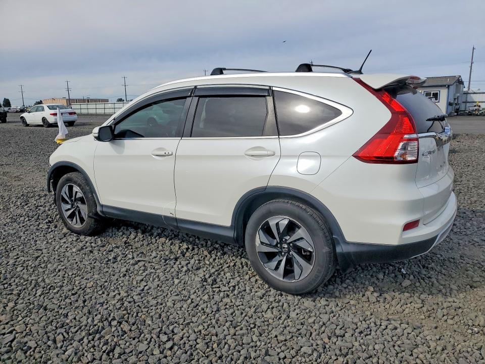 Photo 2 from auction – 2015 HONDA CR-V with VIN 5J6RM4H97FL018230