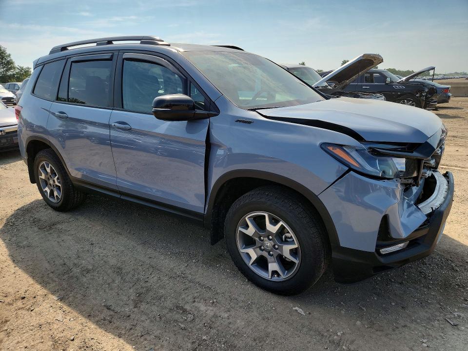 Photo 4 from auction – 2022 HONDA PASSPORT with VIN 5FNYF8H60NB022260