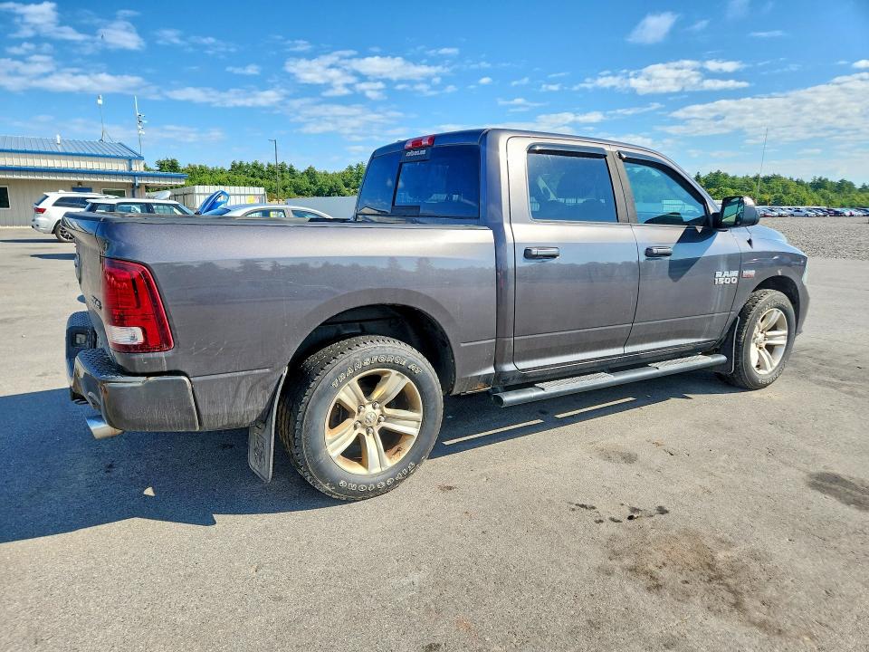 Photo 3 from auction – 2014 RAM 1500 with VIN 1C6RR7MT9ES320303
