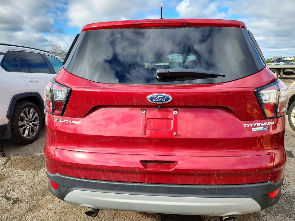 Photo 6 from auction – 2017 FORD ESCAPE with VIN 1FMCU9J93HUD99621