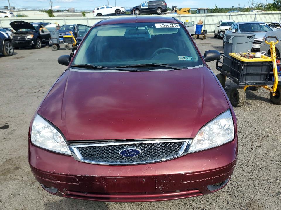 Photo 5 from auction – 2007 FORD FOCUS with VIN 1FAFP31N87W143342