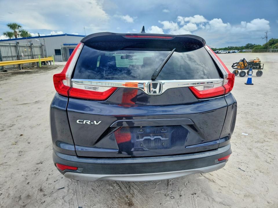 Photo 6 from auction – 2017 HONDA CR-V with VIN 7FARW1H83HE010366