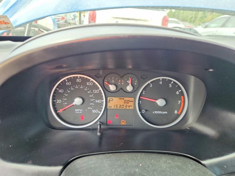 Photo 9 from auction – 2004 HYUNDAI TIBURON with VIN KMHHM65D24U144276