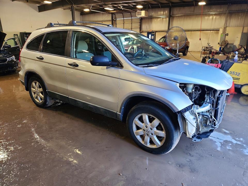 Photo 4 from auction – 2011 HONDA CR-V with VIN 5J6RE4H41BL036685