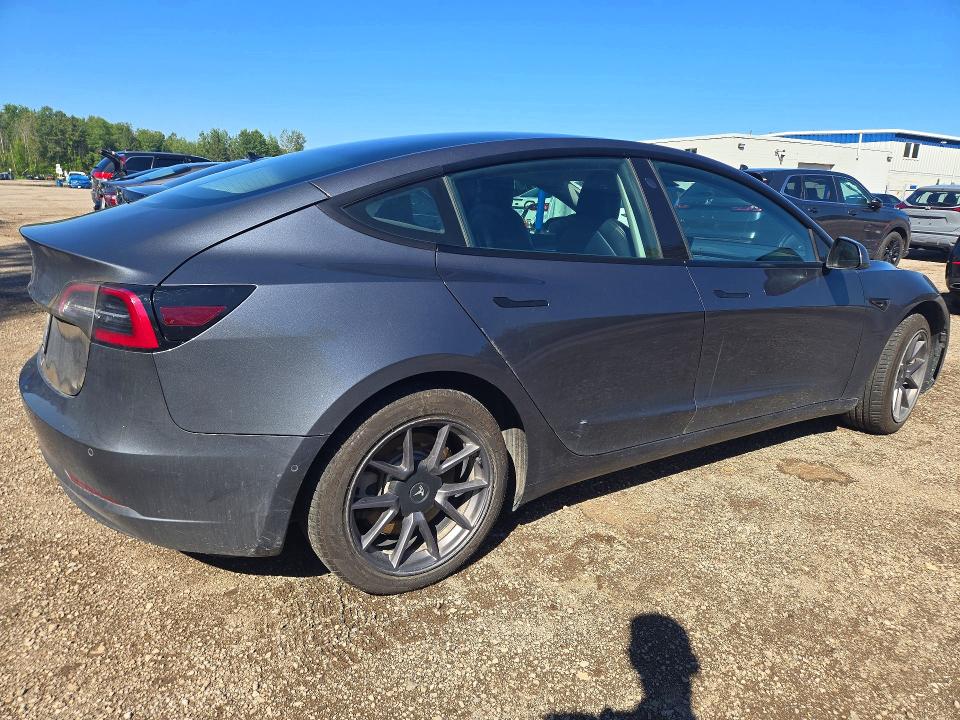 Photo 3 from auction – 2022 TESLA MODEL 3 with VIN 5YJ3E1EA4NF317813