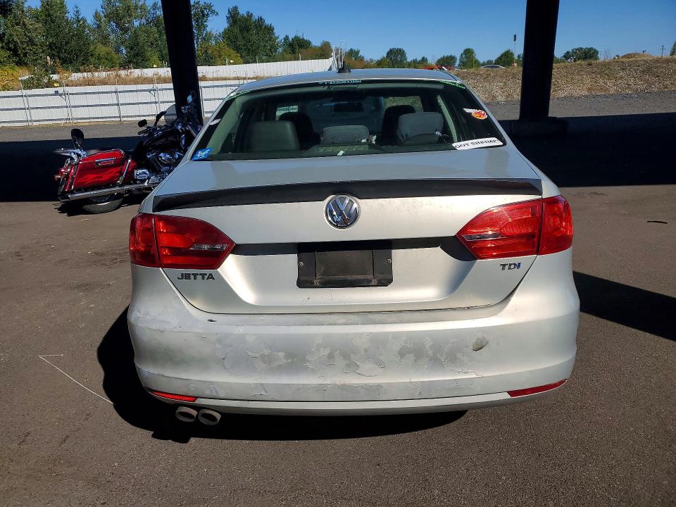 Photo 6 from auction – 2011 VOLKSWAGEN JETTA with VIN 3VWLL7AJ4BM124368