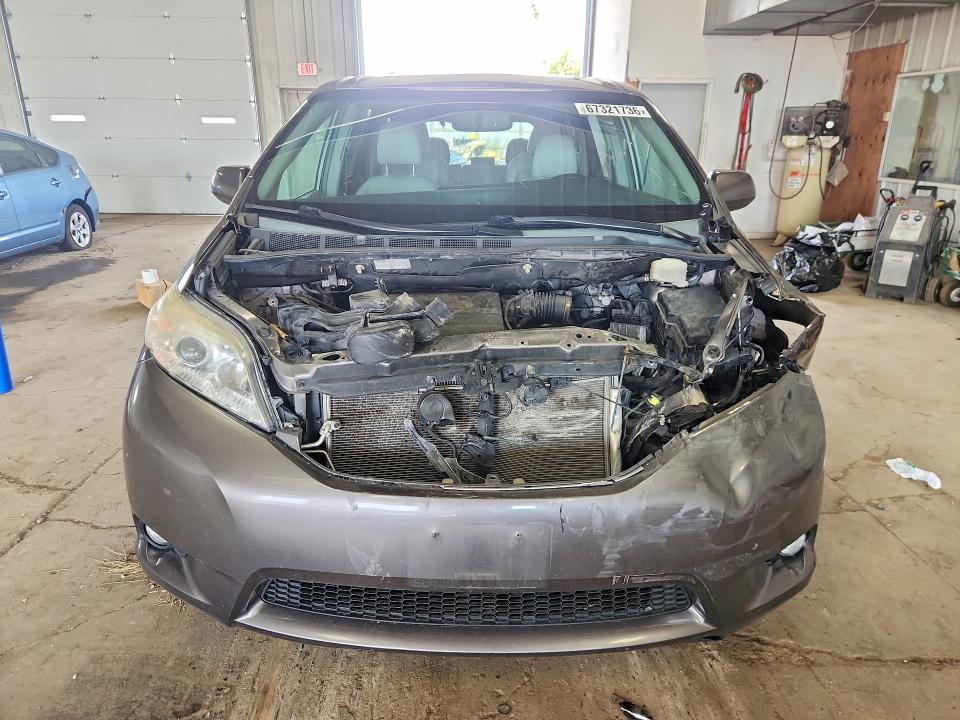 Photo 5 from auction – 2015 TOYOTA SIENNA with VIN 5TDDK3DC5FS104782