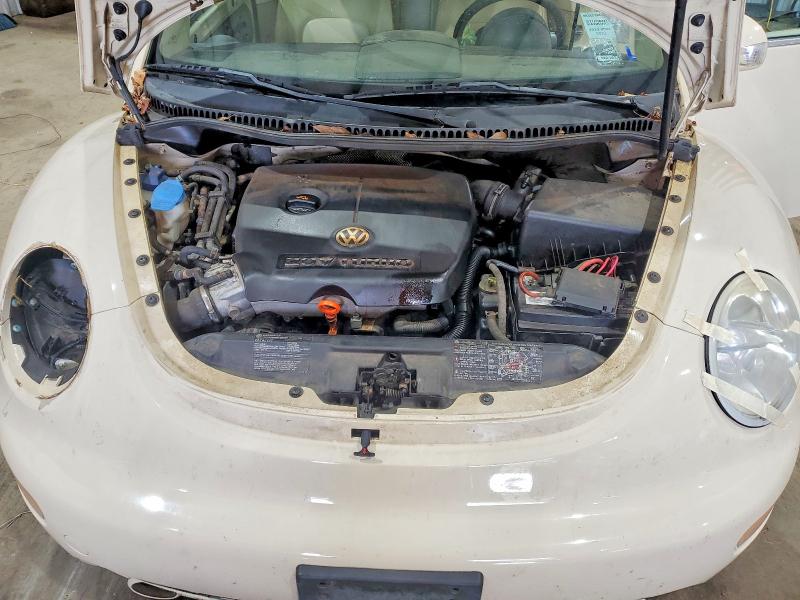 Photo 11 from auction – 2004 VOLKSWAGEN NEW BEETLE with VIN 3VWCD31Y94M336608
