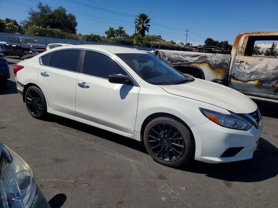 Photo 4 from auction – 2016 NISSAN ALTIMA with VIN 1N4AL3AP1GC250094
