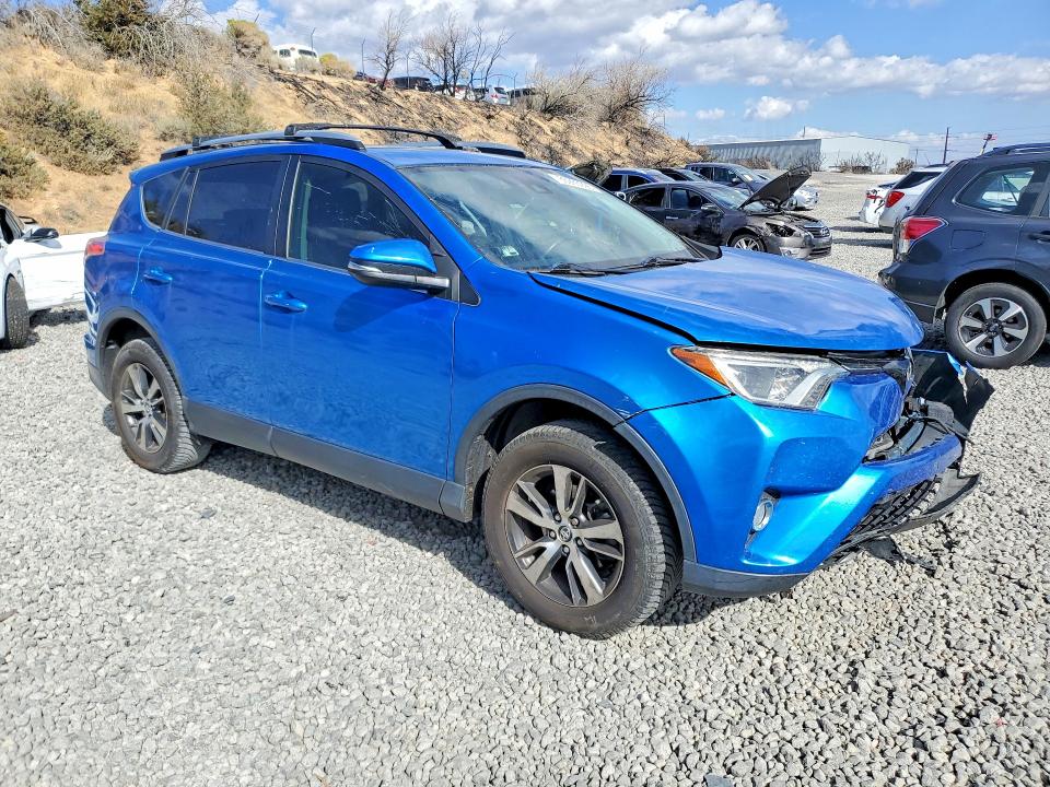 Photo 4 from auction – 2018 TOYOTA RAV4 with VIN JTMRFREV1JJ747410