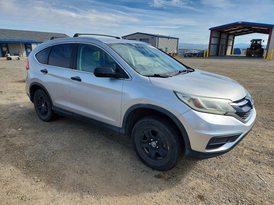 Photo 4 from auction – 2015 HONDA CR-V with VIN 5J6RM4H39FL035395