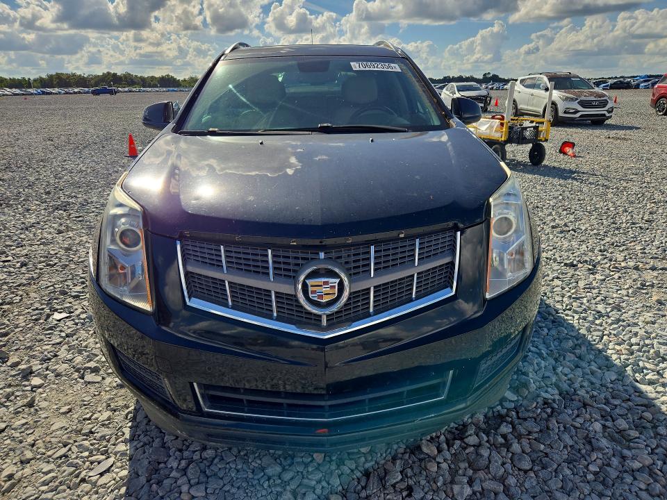Photo 5 from auction – 2012 CADILLAC SRX with VIN 3GYFNAE39CS618817