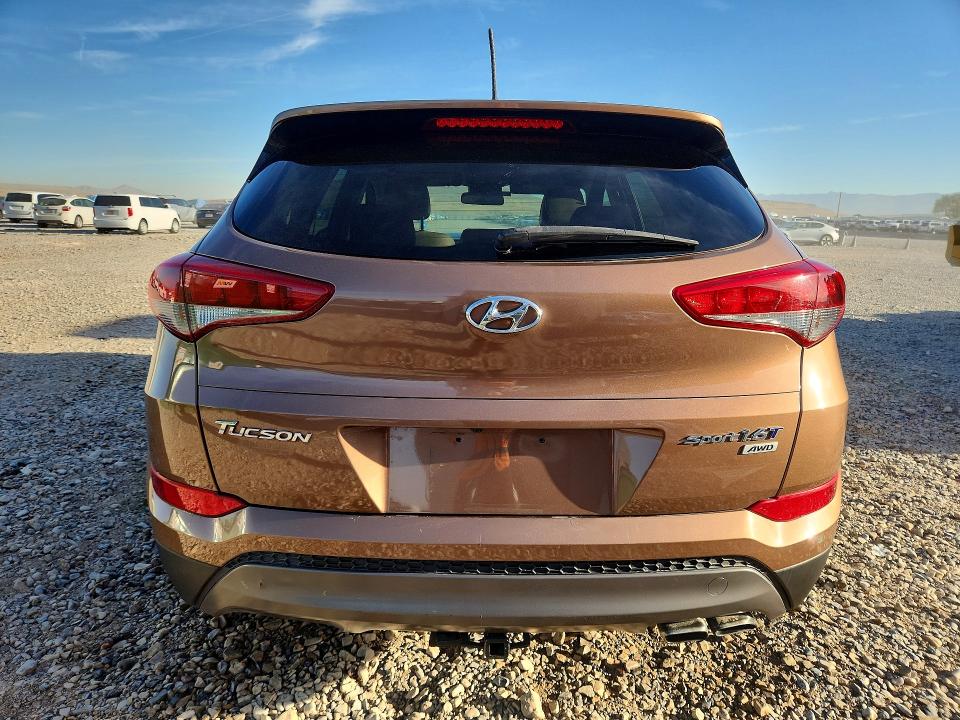 Photo 6 from auction – 2016 HYUNDAI TUCSON with VIN KM8J3CA2XGU105382