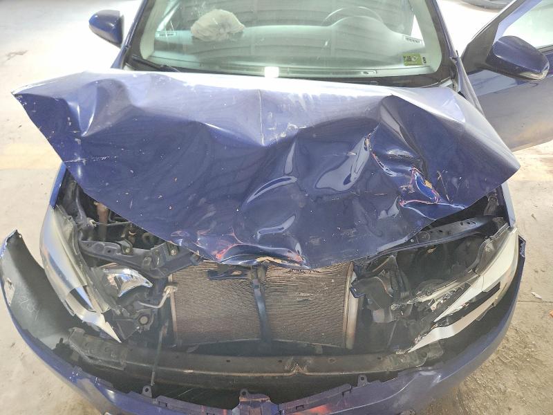 Photo 11 from auction – 2014 TOYOTA COROLLA with VIN 2T1BURHEXEC196947