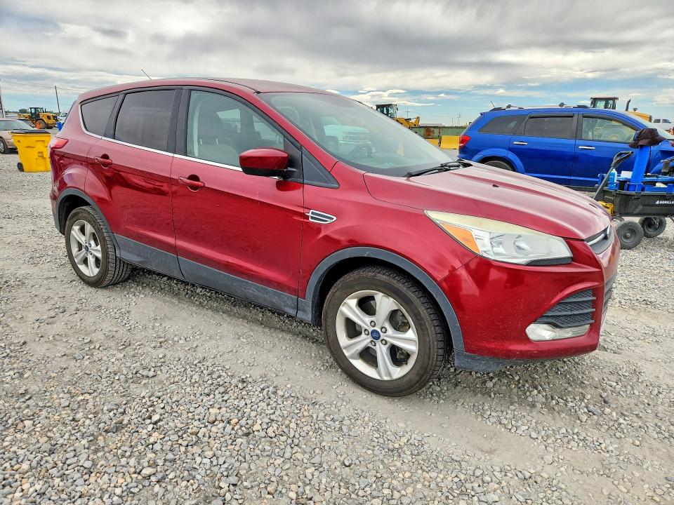 Photo 4 from auction – 2015 FORD ESCAPE with VIN 1FMCU9GX4FUC35975