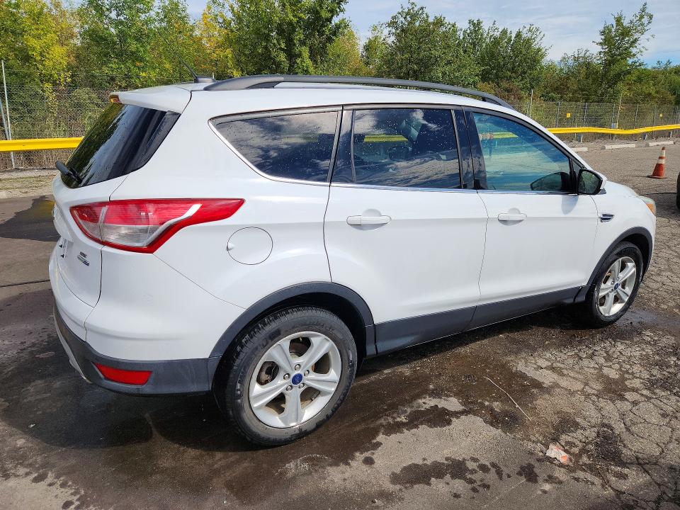 Photo 3 from auction – 2016 FORD ESCAPE with VIN 1FMCU9GX6GUC17060