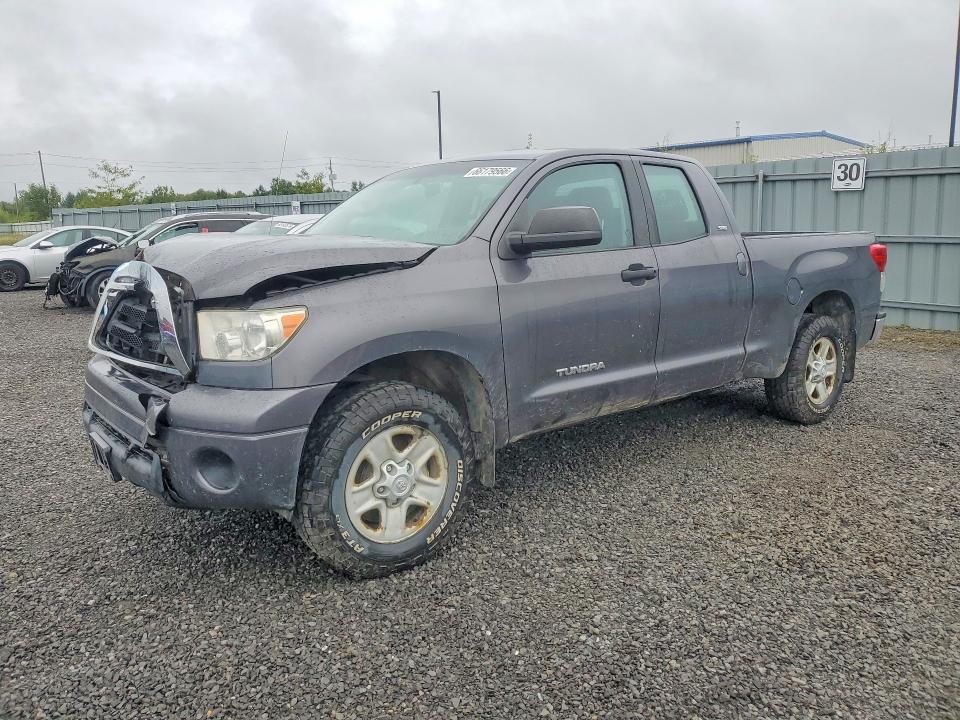 TOYOTA TUNDRA 2011 with VIN 5TFUM5F18BX026679 - Photo from auction